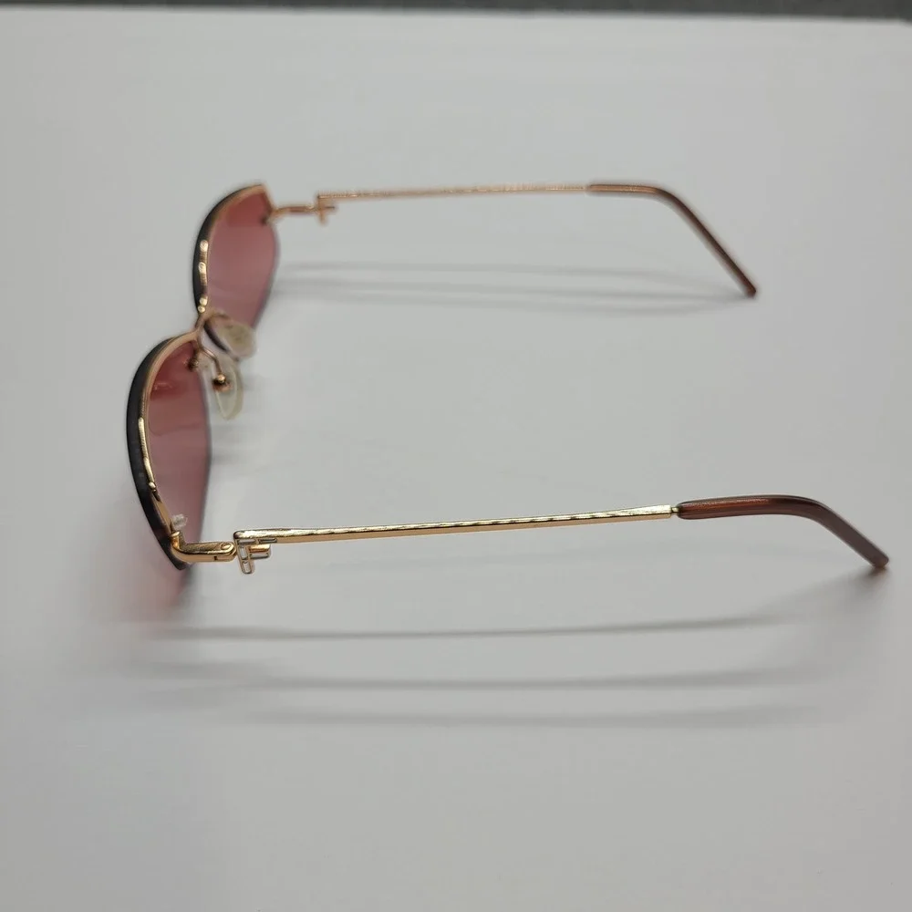 Fendi Pink Lens Rimless Sunglasses with Gold Frame